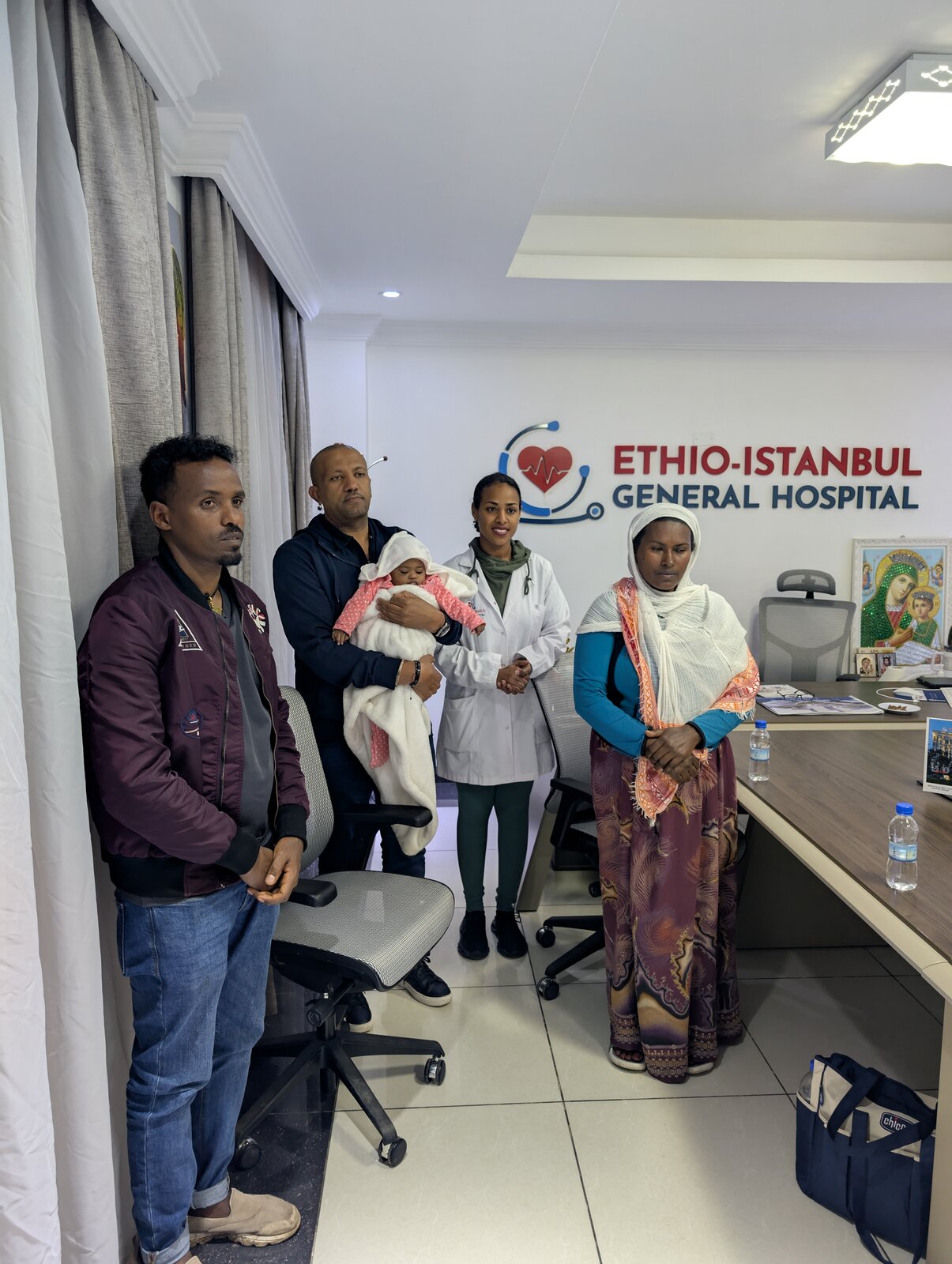 Family members with the newborn baby