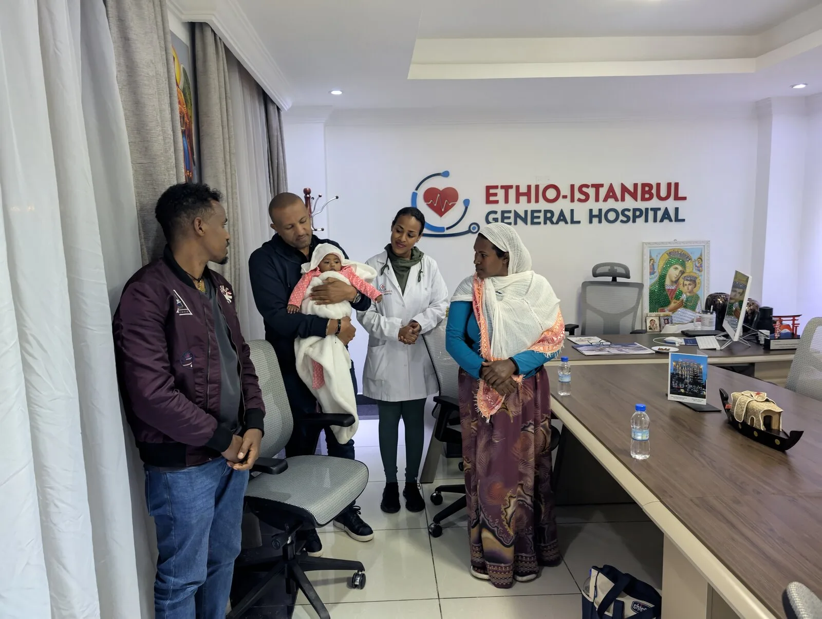 Family celebrating the baby's recovery